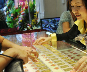 Vàng và USD cùng giảm giá
