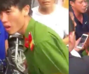 Nam thanh niên mặc sắc phục bị dân vây bắt, tát giữa phố Hà Nội là công an nghĩa vụ