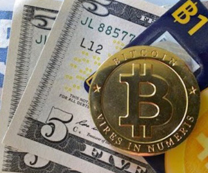 Tiền điện tử Bitcoin "tuột dốc" sau khi chạm mốc 5.000 USD
