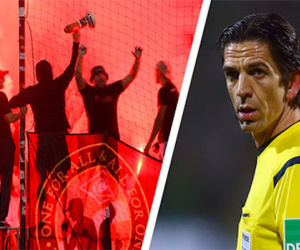 CĐV bắn pháo sáng vào trọng tài ở Champions League