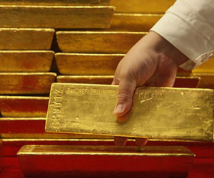 Vàng thế giới lại giảm trước cuộc họp của Fed