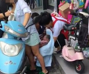 Đang lái xe máy, thai phụ bất ngờ dừng lại để sinh con ngay giữa phố