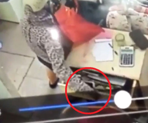 Clip: "Nữ quái" 3 lần mở ngăn tủ trộm điện thoại trong shop quần áo