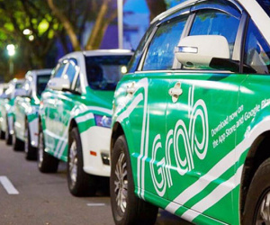 Hà Nội, Sài Gòn cùng kiến nghị dừng Uber, Grab