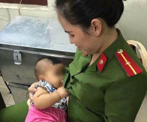 Hà Nội: Bé trai khát sữa bị mẹ bỏ rơi trong nhà nghỉ, nữ công an động lòng cho bú và đưa về nhà chăm sóc