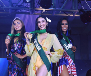 Hà Thu đoạt huy chương vàng phần thi "Trang phục dạo biển" ở Miss Earth