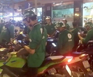 Grab bác tin tài xế GrabBike mang súng thanh toán "xe ôm" truyền thông