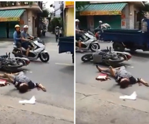 Người phụ nữ co giật vì tai nạn giao thông và cái nhìn lạnh lùng của người đi đường