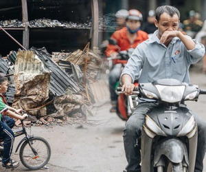 Cuộc sống xung quanh nhà kho Rạng Đông sau vụ cháy: Người lớn cay mắt và khó thở, trẻ nhỏ được sơ tán