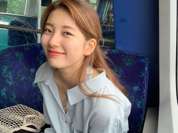 Cứ ngắm ảnh du lịch của Suzy, bạn sẽ có cả tá gợi ý kiểu tóc thật xinh cho ngày hè
