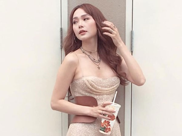 Minh Hằng trẻ trung ở tuổi 32 khi vô tình lọt ống kính người qua đường, nhưng đôi chân 'lực điền' mới gây chú ý