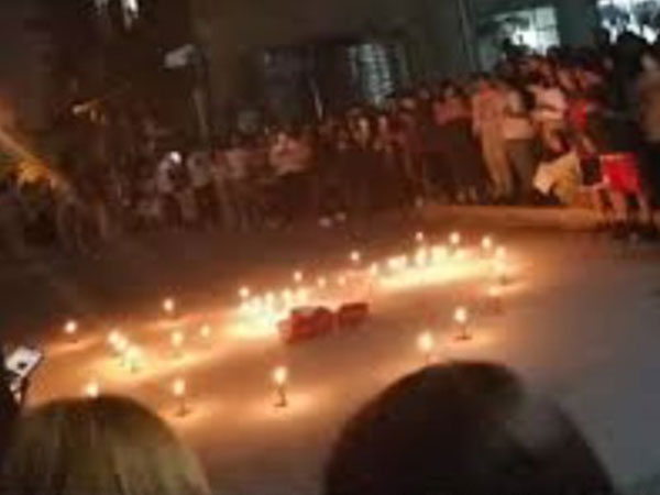Thanh niên 'số nhọ' dày công xếp nến hình trái tim rồi ôm hoa đứng dưới sân ký túc xá, gọi đúng họ đúng tên crush để tỏ tình nhưng phát hiện...nhầm khu