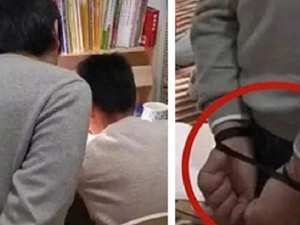 Ông bố tự trói tay mình để dạy con học bài, hỏi ra mới biết là nỗi khổ không của riêng ai