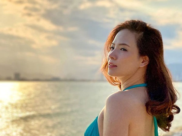 Đan Lê thả dáng với bikini, tự tin vì được ông xã Khải Anh chụp