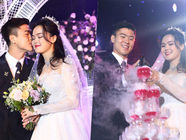 Duy Mạnh hôn vợ trong tiệc cưới