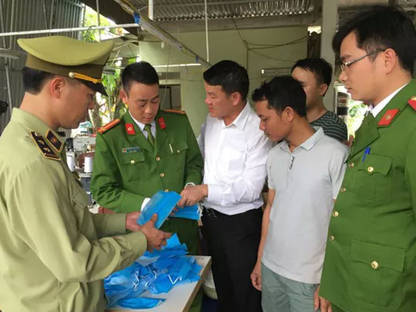 Chủ lò mổ lợn sản xuất khẩu trang y tế giả đối diện khung hình phạt nào?