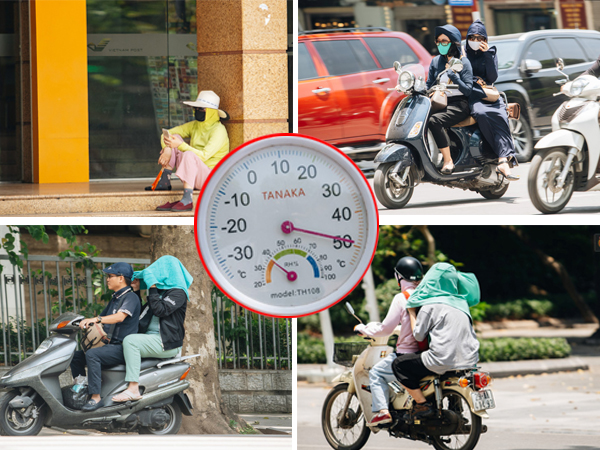 Ảnh: Nhiệt độ ngoài đường tại Hà Nội lên tới 50 độ C, người dân trùm khăn áo kín mít di chuyển trên phố