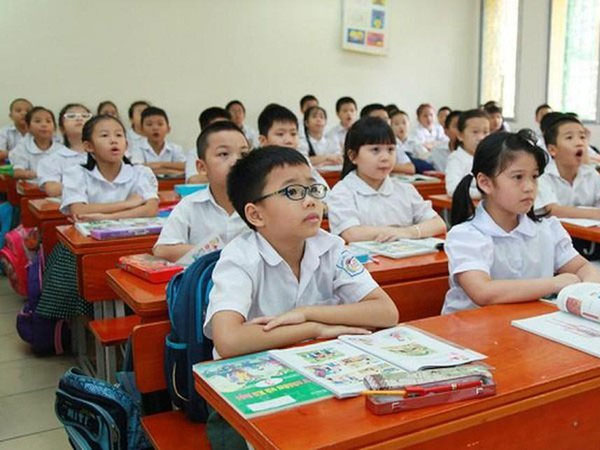 Từ 1/7, học sinh tiểu học không phải đóng học phí