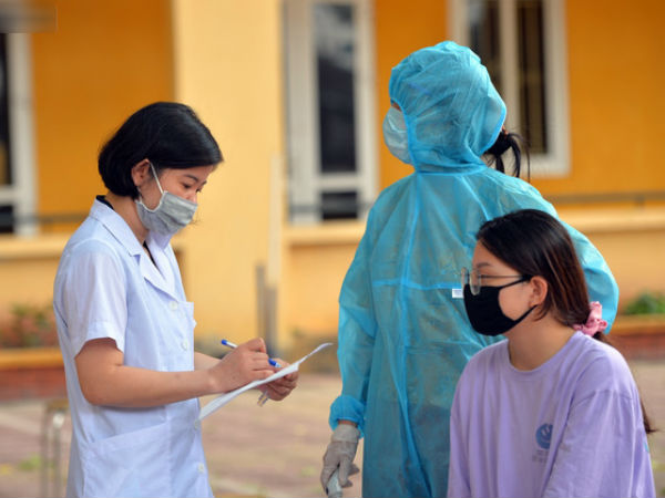 Ảnh: Hà Nội bắt đầu xét nghiệm PCR đối với người trở về từ Đà Nẵng