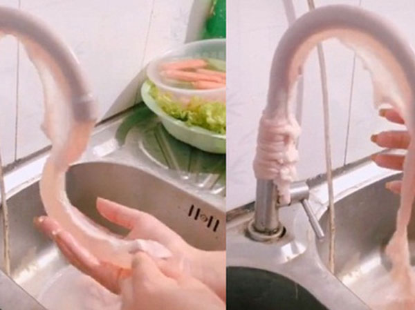 Đoạn video clip cô gái bày mẹo xỏ ruột heo vào vòi nước rồi xả nước để rửa sạch gây tranh cãi