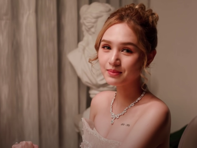 Xoài Non giật spotlight trong hình cap vội ở hậu trường MV cưới, so với ảnh đã photoshop mới thấy nể
