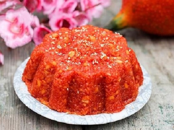 Cách làm xôi gấc đẹp mắt cúng ông Công ông Táo