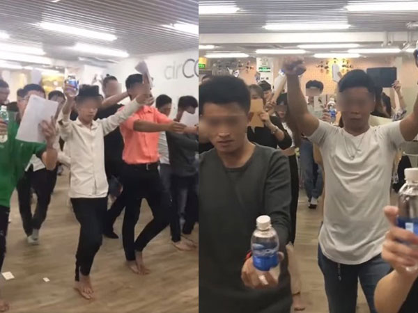 Cận cảnh giờ học của hội 'tỷ phú tương lai' gây choáng: Lớp cả trăm người tay cầm chai nước, co quắp 1 chân,hô khẩu hiệu làm giàu