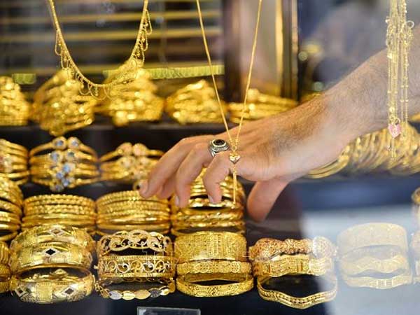 Giá vàng thế giới, chứng khoán Mỹ cùng đi xuống