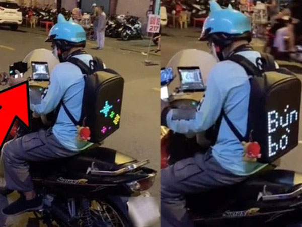 Bắt gặp anh shipper 'chịu chơi' nhất Việt Nam: Nhìn dàn đồ 'căng đét' trên người mà dân mạng choáng váng, đúng là đi làm vì đam mê!