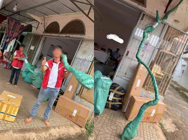 Nhìn đơn hàng 'dài như cái cây' khiến hai người khiêng còn chật vật, shipper tái mặt nhưng vẫn cố gắng đi giao