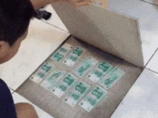 Vợ phát hiện 'quỹ đen' của chồng từ một viên gạch nứt