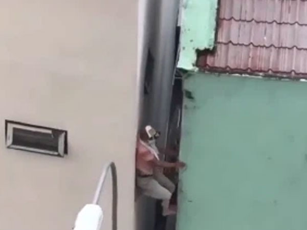Nam thanh niên liều lĩnh trèo qua mái nhà, trượt khe tường trốn khỏi khu cách ly trong chưa đầy 1 phút
