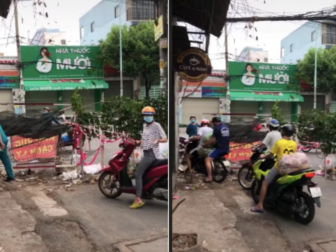 Xôn xao clip người dân phá rào chắn phòng dịch để chạy xe máy ra ngoài ở TP.HCM