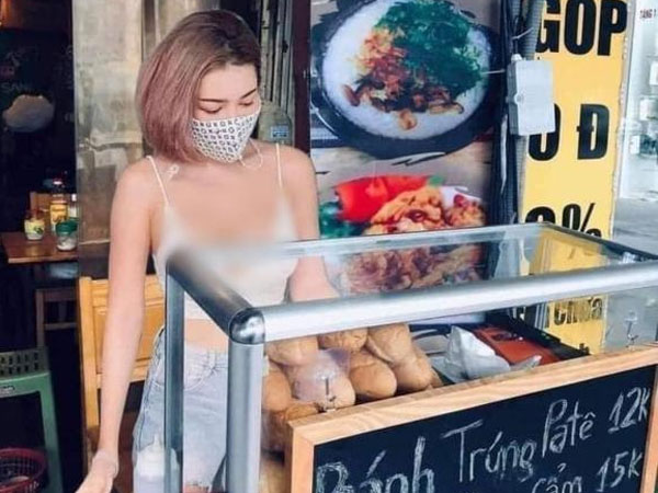 Cô chủ quán nóng bỏng đứng bán bánh mì làm dân mạng 'chao đảo'