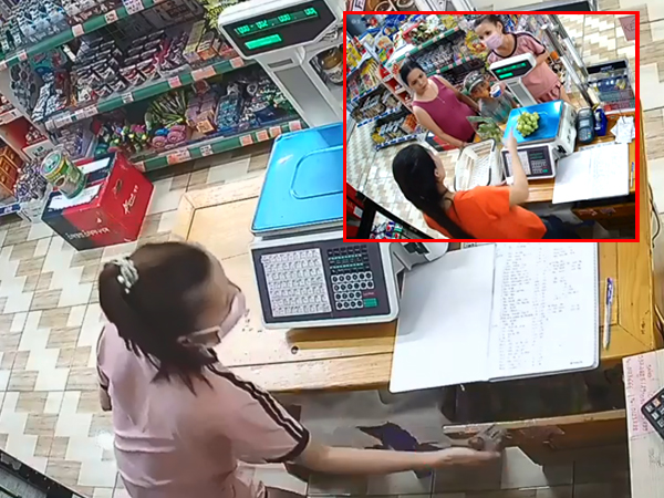 Chủ quán đon đả tươi cười mà không hề hay biết màn dàn cảnh trộm cắp của 3 mẹ con