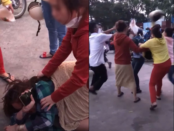 Clip: Bị nhóm phụ nữ đấm đá, dùng mũ bảo hiểm phang tới tấp, cô gái trẻ liên tục phủ nhận: 'Tôi không quen chồng chị'