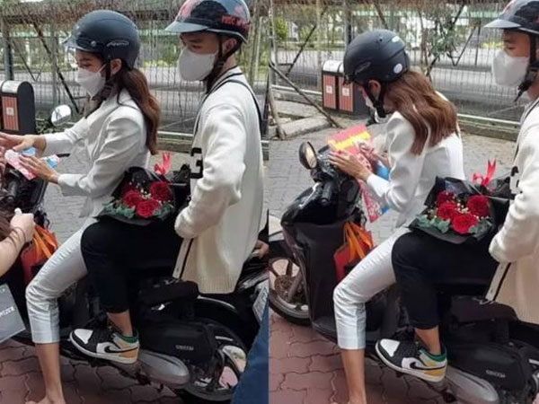 Hoa hậu Thùy Tiên chạy show bằng xe máy, còn 'phục vụ' cho cả trợ lí