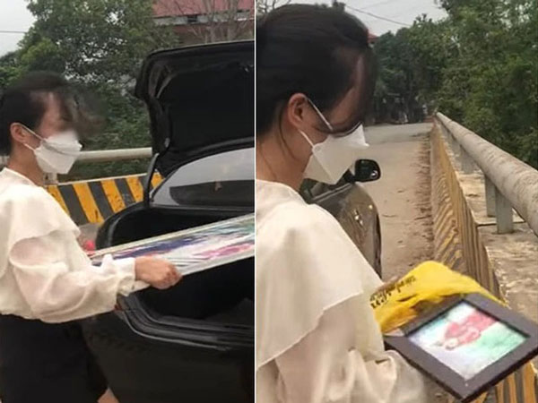 Cô gái quay video đi ô tô lên cầu vứt ảnh cưới xuống sông rồi tự mình đăng lên mạng, dân tình mỉa mai: 'Tưởng thế là hay lắm!'