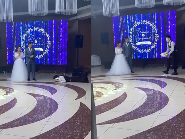 Trót vấp ngã trong thời khắc quan trọng, anh phục vụ phá nát cả chiếc bánh cưới nhưng hành động của cô dâu chú rể mới khiến dân tình tranh cãi