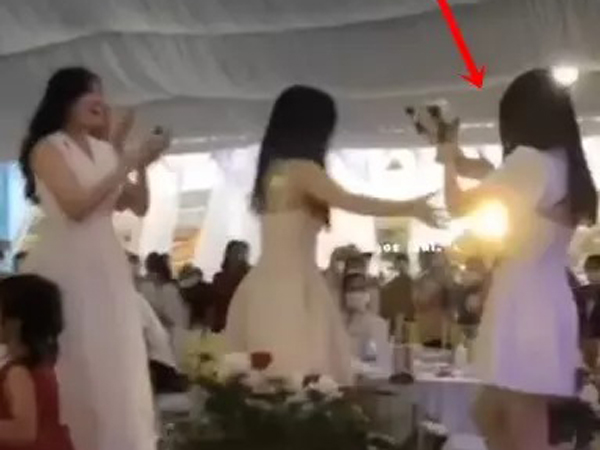 Bất ngờ danh tính cô gái nhường hoa cưới cho Hòa Minzy
