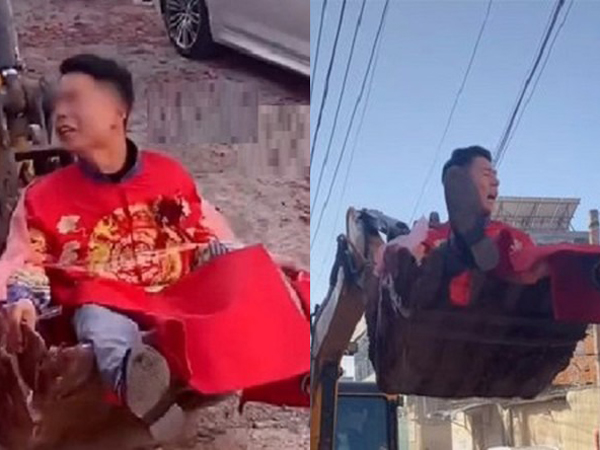 Phẫn nộ cảnh chú rể bị trói vào xe cẩu đưa lên trời, suýt mất mạng vì chạm vào dây điện cao thế: 'Định biến đưa dâu thành đưa ma hay sao?'