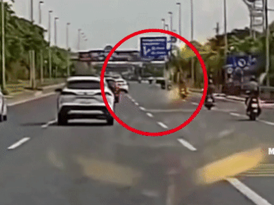 Clip: Xe tải nhập làn ẩu, hất văng 2 người đi xe máy ở Hà Nội