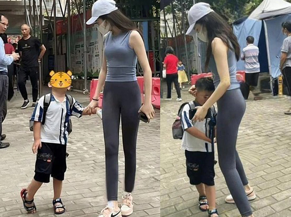 Mặc đồ tập bó sát cơ thể đến đón con trai, người mẹ trẻ có thái độ ngạc nhiên khi bị mọi người 'săm soi'