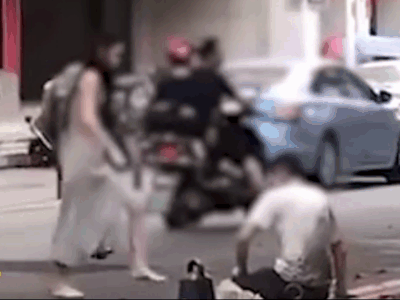 Clip: Cô gái tung cước đánh bạn trai dã man giữa phố và lý do khó tin