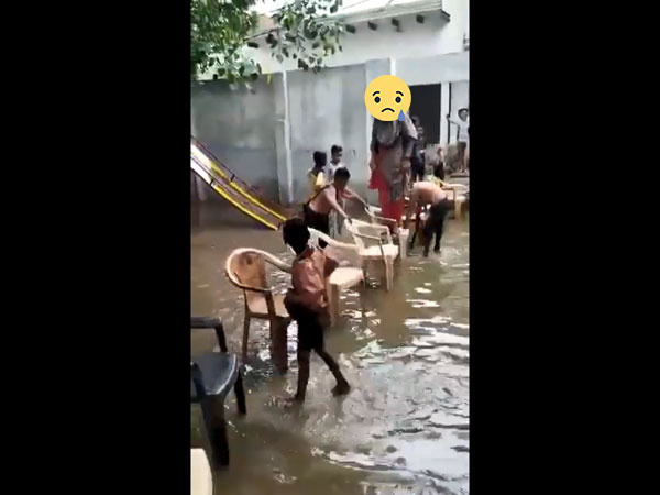 Cô giáo gây phẫn nộ khi bắt học sinh chịu ngập để làm cầu cho mình vào lớp