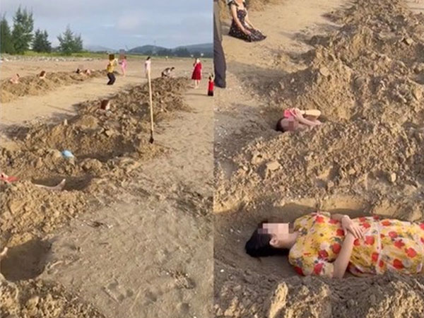 Nhóm du khách đào hố cát 'nằm thiền' trên bãi biển: 'Các hố cát đào sẵn rồi lấp lại, chỉ trừ phần mũi để thở'