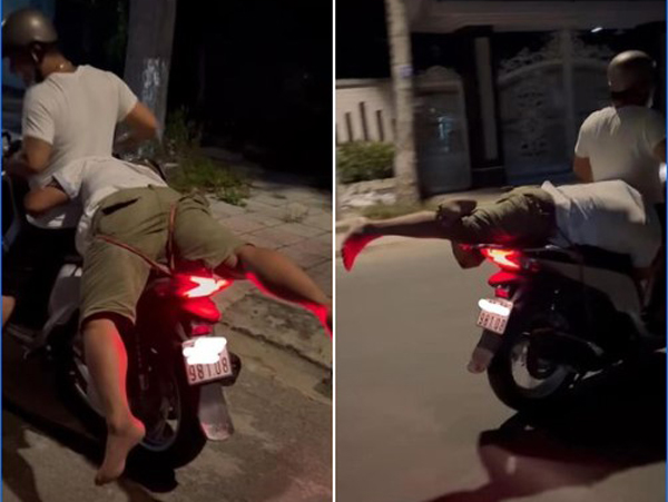 Thấy bạn say đến lú lẫn, thanh niên lấy dây thừng buộc bạn vào xe máy đưa về
