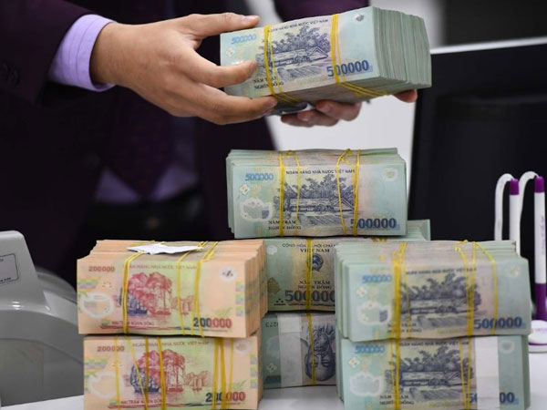 Ngân hàng Nhà nước tăng tỷ giá sau quyết định đêm qua của Fed