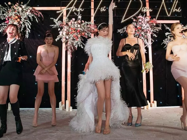 Diệu Nhi quăng giày, mặc váy cưới với dép lê để 'quẩy' cho sung