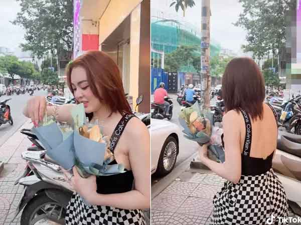 Hot girl bán hàng Trang Nemo chơi sang, cho nhân viên hẳn bó hoa tiền mang về tặng vợ